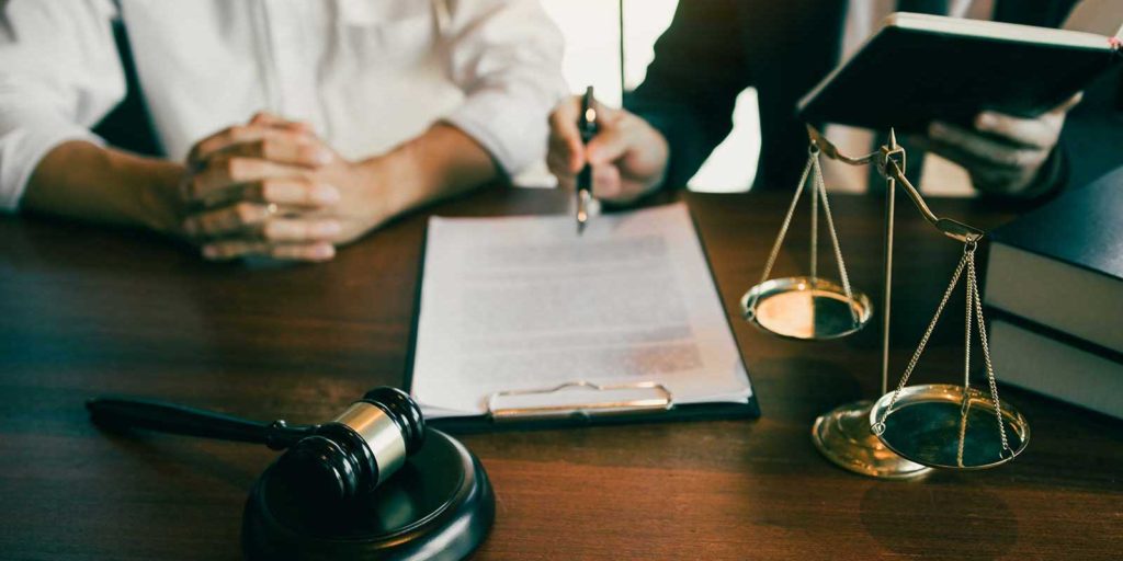 Maryland divorce attorney and his client in the discovery phase of litigation