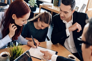 parents and lawyer in a custody evaluation meeting with child