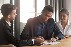 Attorney with clients working on appeals case