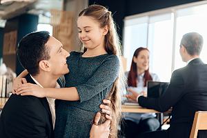 Father with daughter in office