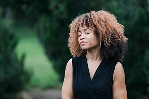 Woman standing outside in nature