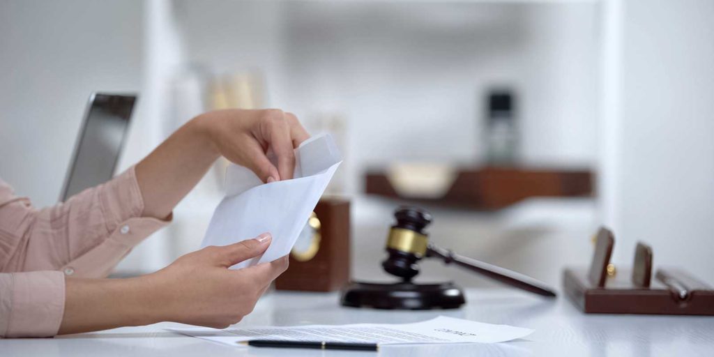 Maryland family law attorney checking clients alimony check