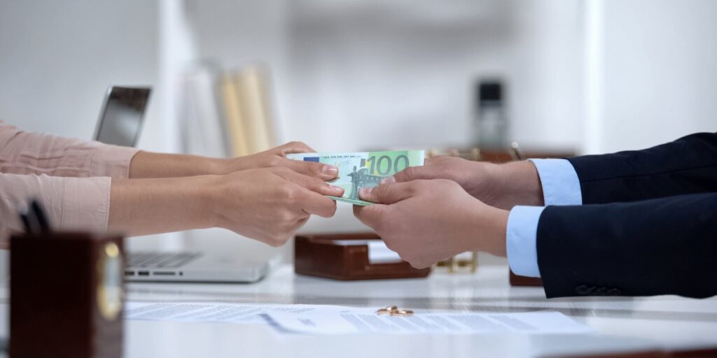 hands pulling euro money