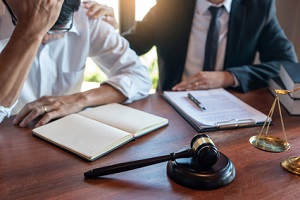 judge consult or discussing contract papers with Businessman client in office