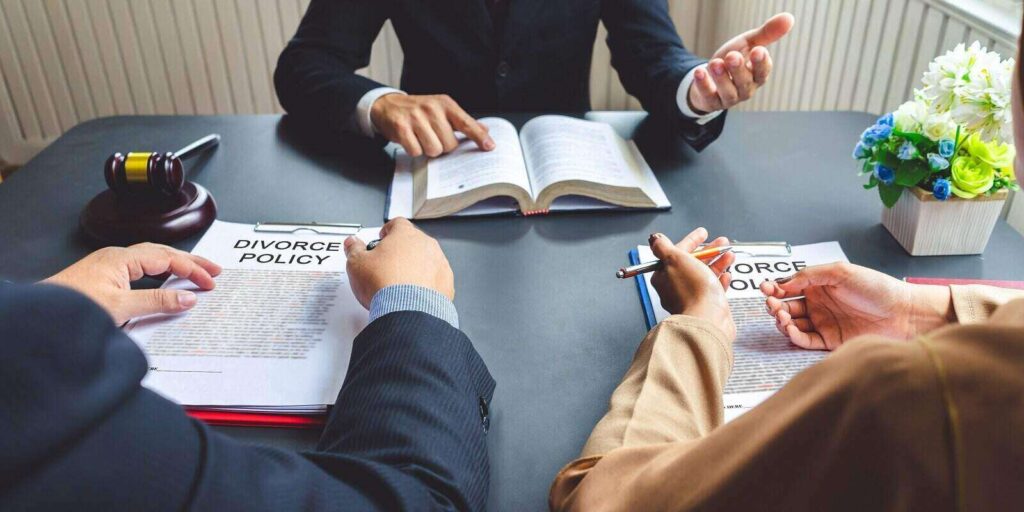 couple consulting a lawyer about agreement on the divorce