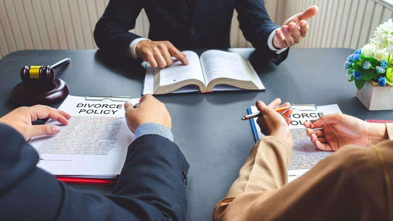 couple consulting a lawyer about agreement on the divorce