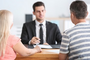 mature couple at notary public office