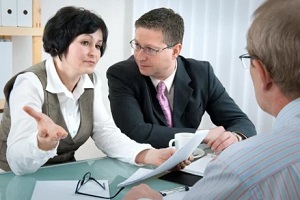 lady with lawyer arguing with husband