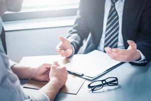 man discussing with lawyer