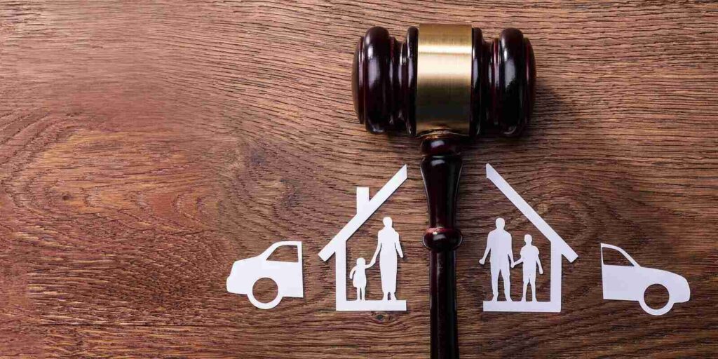 judge mallet between the split paper cutout family and car