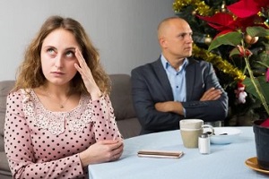 upset couple on table