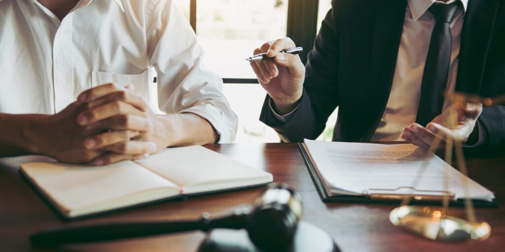 lawyer explained to the client about the law that must be brought against the court case