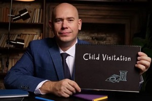 lawyer holding child visitation board