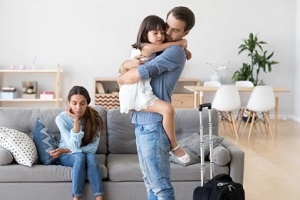 unhappy diverse family in living room at home