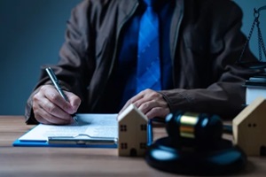 in a divorce business concept, the judge's gavel, law book placed on desk in courtroom represent gravity and seriousness of situation as couples resolve conflicts