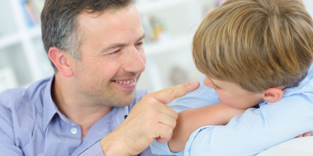 a father and son at home