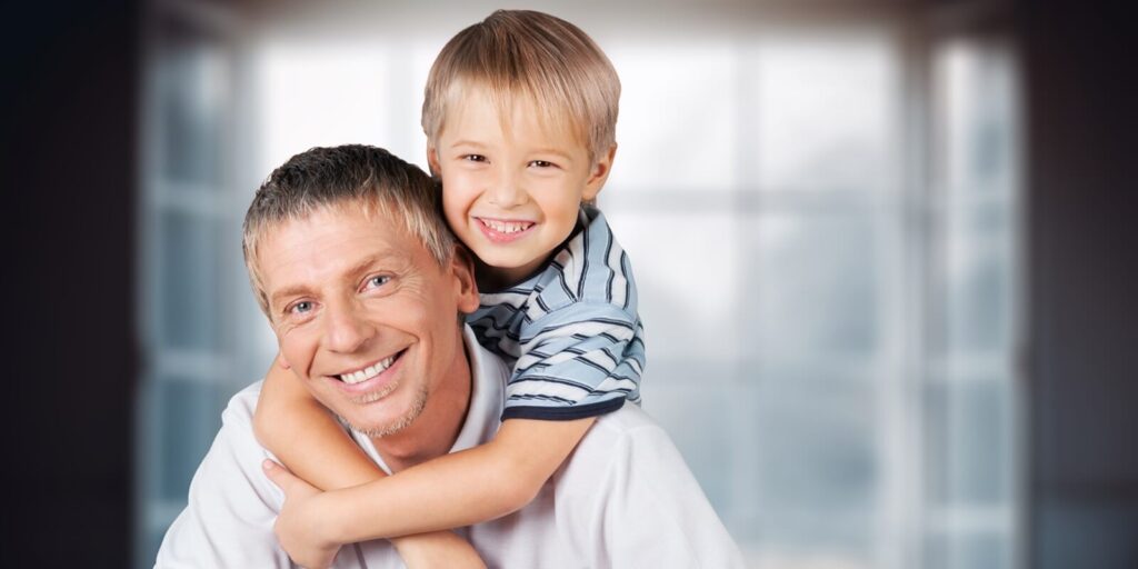 single divorced young dad and happy small child