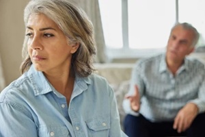 mature couple having argument at home