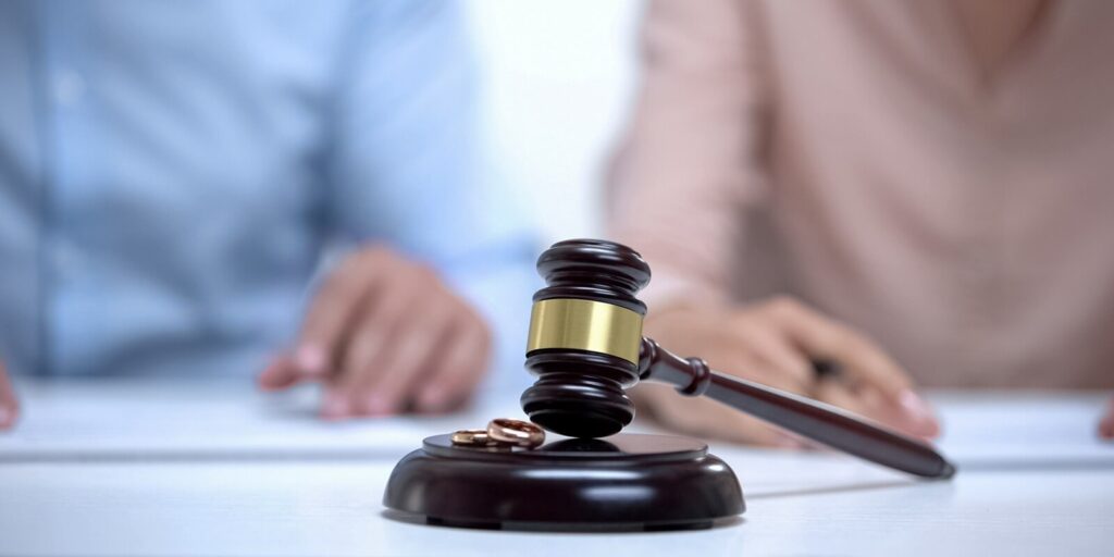 marriage rings and gavel closeup