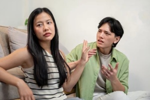 asian couple argument with eachother
