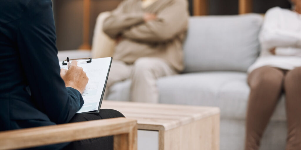 Maryland psychologist writing, divorce and couple in therapy, conversation and session in office