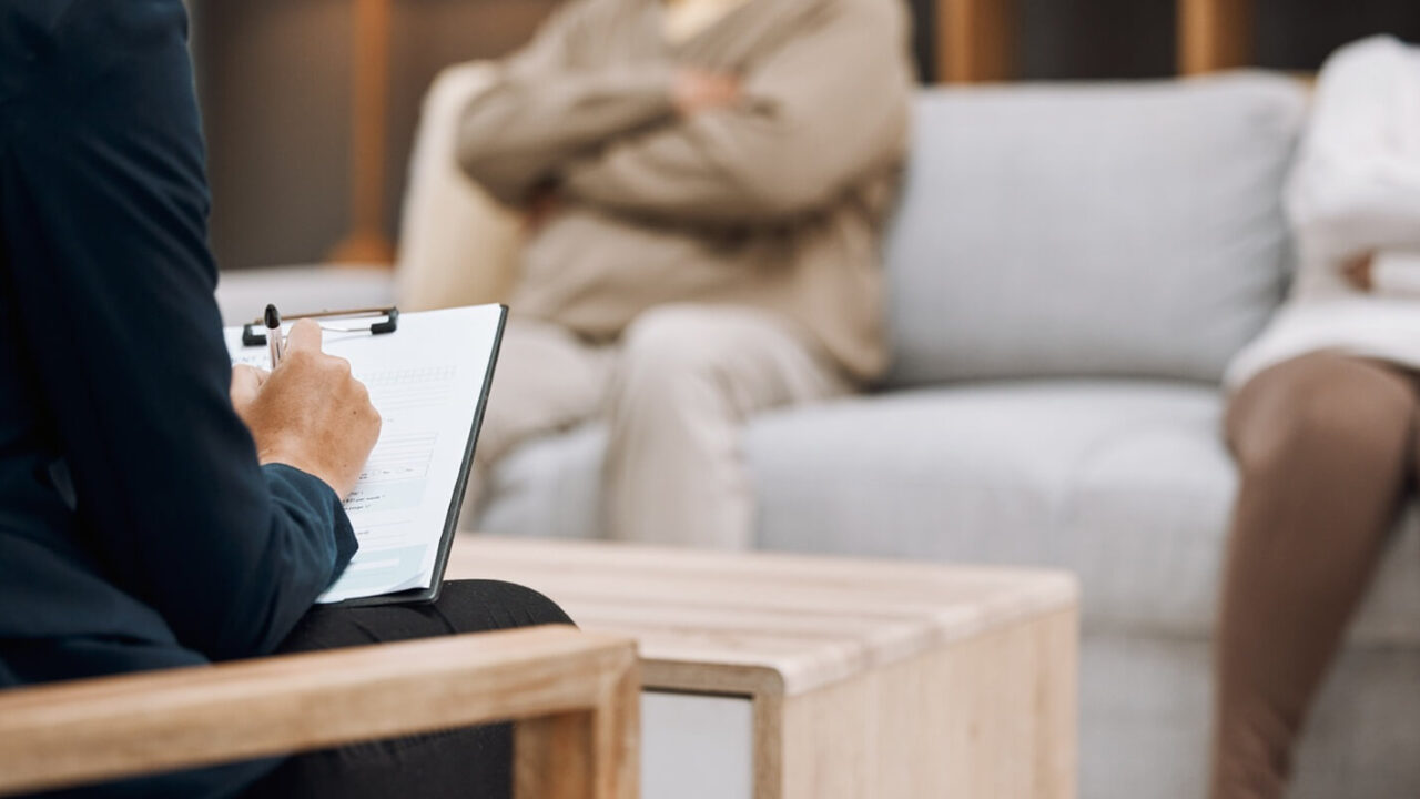 Maryland psychologist writing, divorce and couple in therapy, conversation and session in office