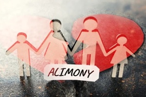 family figure on table and broken heart, double exposure