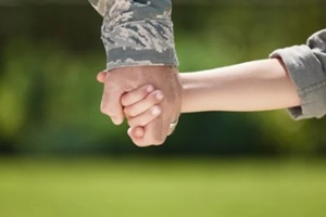 soldier and closeup of family, love and bonding with child, reunion or return from military
