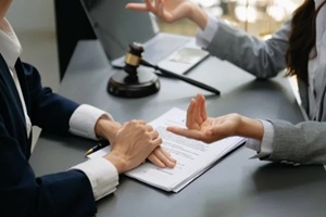 business lawyers are consulting lawyers for women entrepreneurs to file copyright lawsuit with laptop and tablet