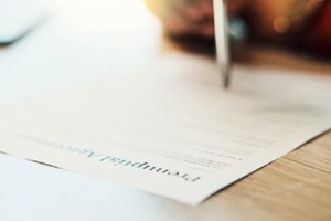 person and writing for marriage on document of prenuptial agreement, compliance and wedding contract