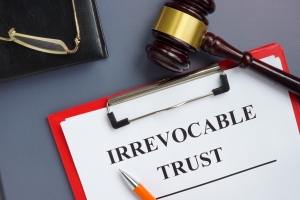 Irrevocable Trust Document on Clipboard with Gavel